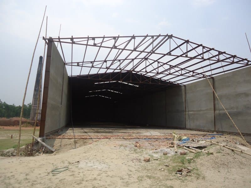 Steel shed frame with scaffolding
